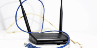 Old Internet Wireless Router with Ethernet Cables