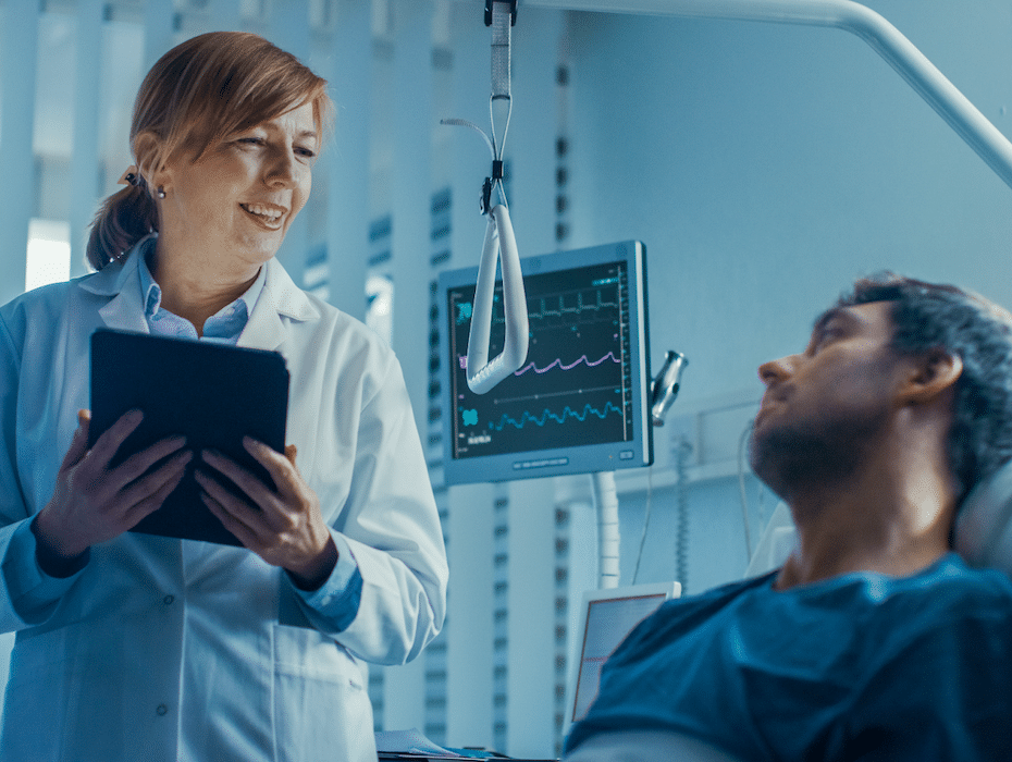 Payer costs skyrocket with physician turnover | #customersupport #supporticket - purshoLOGY Physician works into the late-night hours by attending to a patient lying in a hospital bed