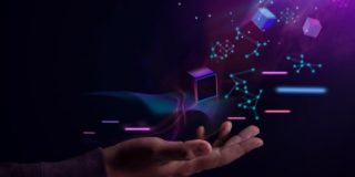 Web 3 stock image featuring a hand held out with cubes and glowing dots floating above it.