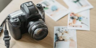 Photo camera with printed photos