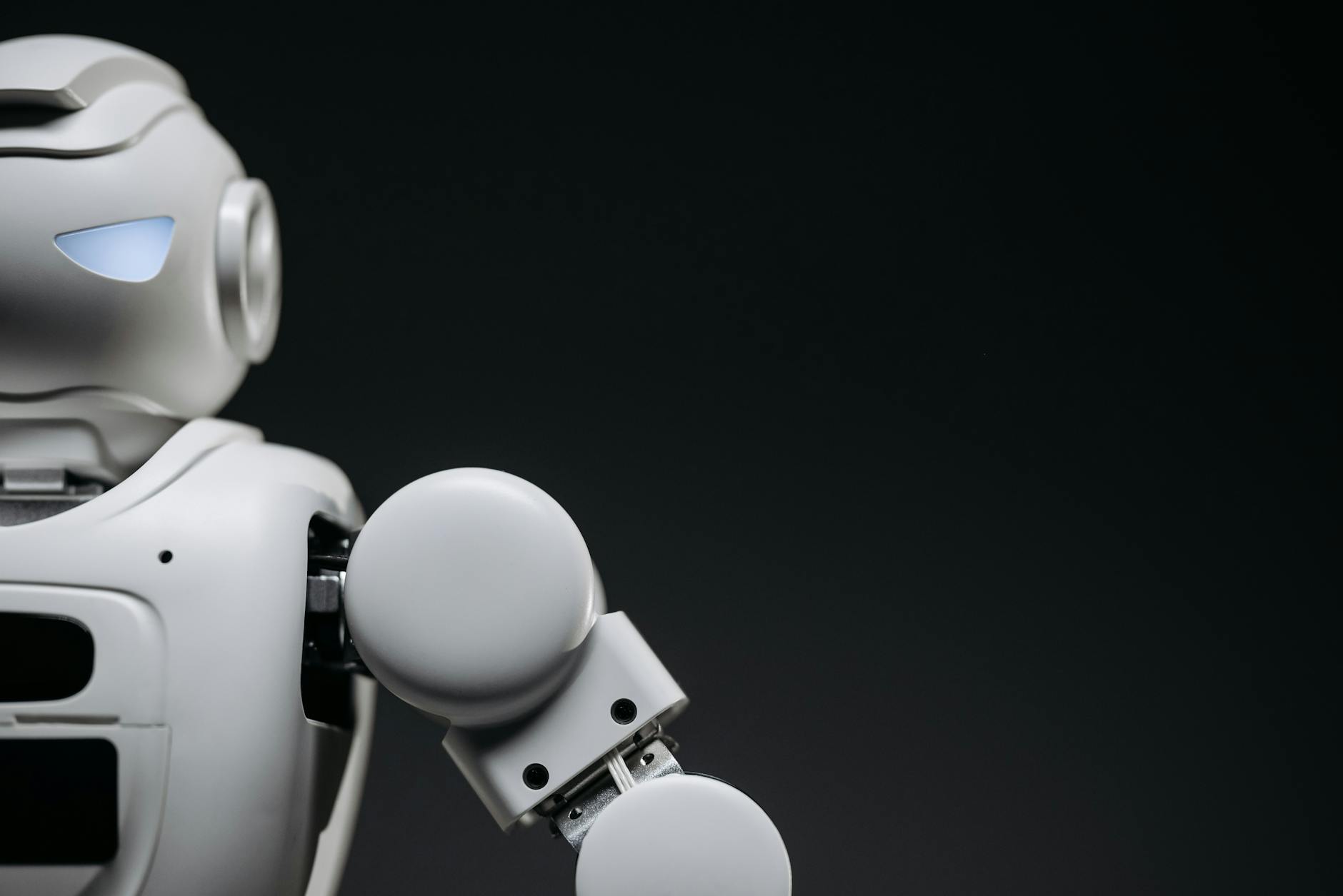 Grayscale Photo of a Futuristic Robot