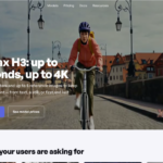 Person riding a bicycle toward the camera on a city bridge with ornate lamps and buildings in the background, overlaid by large white headline text.