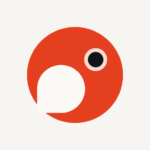 Abstract red circular logo with a white bite-like notch and a small pink-rimmed black eye.