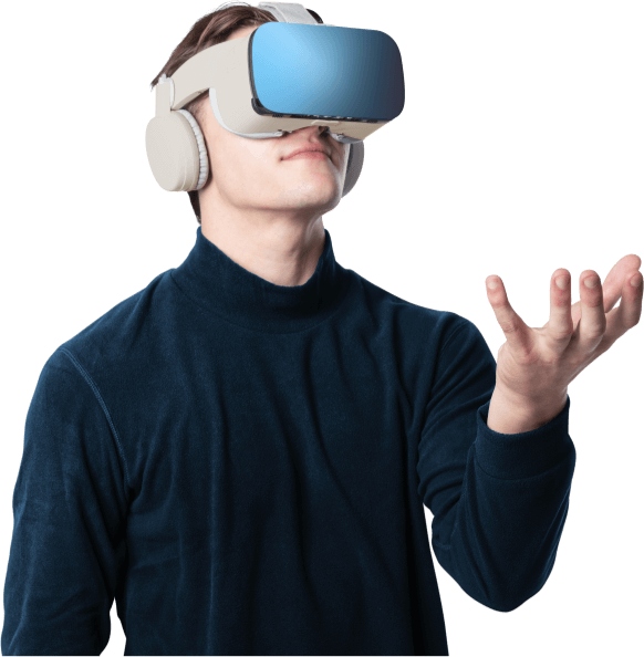 Person wearing a virtual reality headset and reaching forward with one hand, as if interacting with a VR environment in a navy sweater
